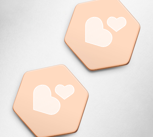 sterling-silver-hexagon-stud-earrings-18k-rose-gold-zoomed-in-6130e76f03549.png